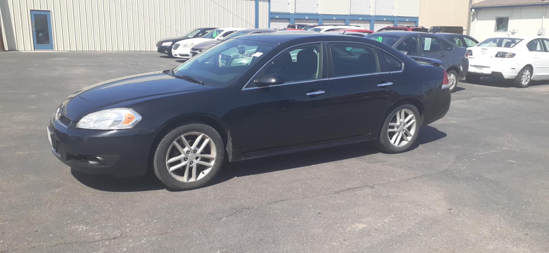 2016 Chevrolet Impala Limited LTZ (2G1WC5E3XG1) with an 3.6L V6 DOHC 16V FFV engine, 6A transmission, located at 2015 Cambell Street, Rapid City, SD, 57701, (605) 342-8326, 44.066433, -103.191772 - CARFAX AVAILABLE - Photo#1